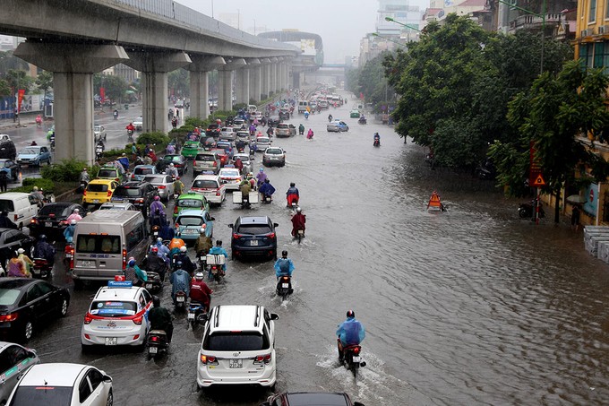 Thời tiết ngày 18/7: Áp thấp và gió Đông Nam gây mưa lớn ở Bắc Bộ và Bắc Trung Bộ