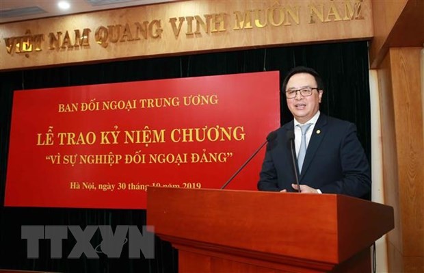 Ông Hoàng Bình Quân, Ủy viên Trung ương Đảng, Trưởng Ban Đối ngoại Trung ương phát biểu. (Ảnh: Doãn Tấn/TTXVN)