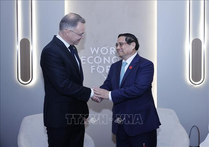 Thủ tướng Phạm Minh Chính gặp Tổng thống Ba Lan Andrzej Sebastian Duda. Ảnh: Dương Giang/TTXVN