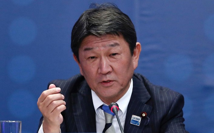 Bộ trưởng phụ trách đàm phán thương mại với Mỹ Motegi Toshimitsu phát biểu trong buổi lễ ký kết thỏa thuận thương mại Đối tác xuyên Thái Bình Dương (TPP), tại Santiago, Chile ngày 8/3/2018. (Ảnh: Reuters)