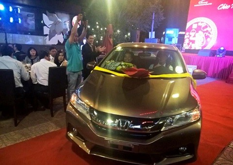 Nhiều doanh nghiệp địa ốc chạy đua thưởng Tết bằng căn hộ, ô tô