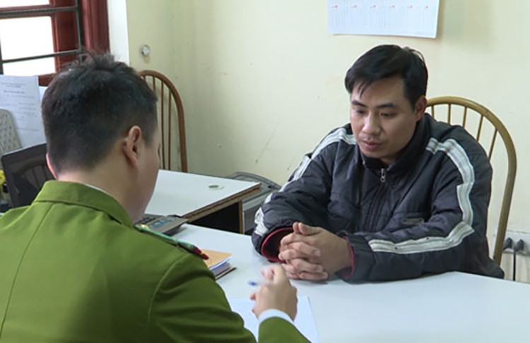 Đối tượng Nguyễn Trọng Trình tại cơ quan Công an. Ảnh: VnExpress