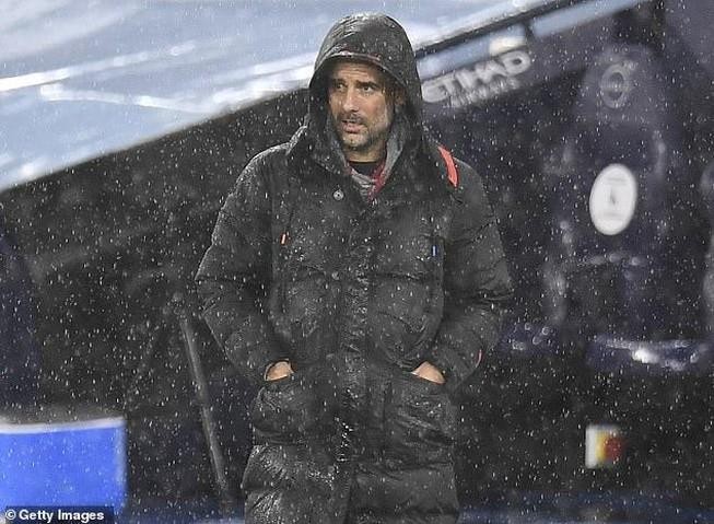 Pep Guardiola đối mặt sóng gió ở Manchester City vì COVID-19. ẢNH: GETTY