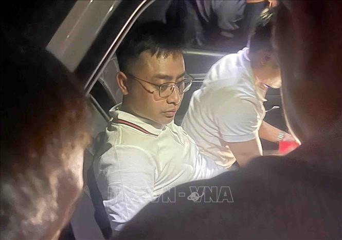 Đối tượng truy nã Bùi Đình Khánh bị lực lượng chức năng bắt giữ vào tối 18/4. Ảnh: TTXVN
