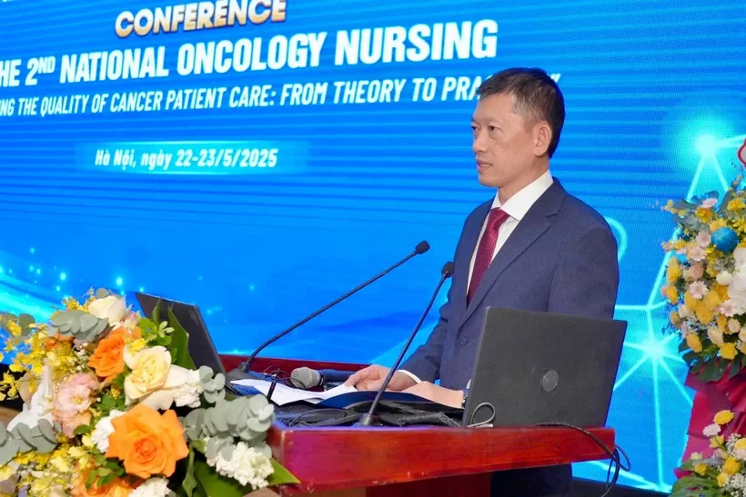 Tiến sỹ Dương Huy Lương - Phó Cục trưởng Cục Quản lý khám chữa bệnh phát biểu tại Hội thảo. Ảnh: PV/Vietnam+