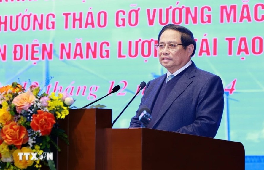 Thủ tướng Phạm Minh Chính chủ trì hội nghị tháo gỡ khó khăn cho các dự án năng lượng tái tạo. Ảnh: Dương Giang.TTXVN