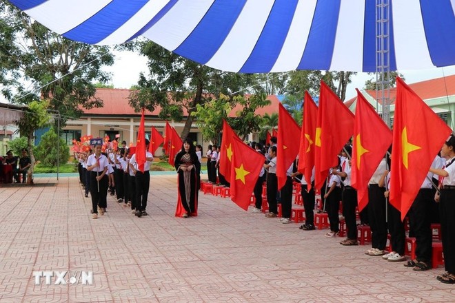 Học sinh lớp 6 trường THCS Võ Thị Sáu (xã Buôn Đôn, tỉnh Đắk Lắk) tại lễ khai giảng. Ảnh: Nguyên Dung/TTXVN.