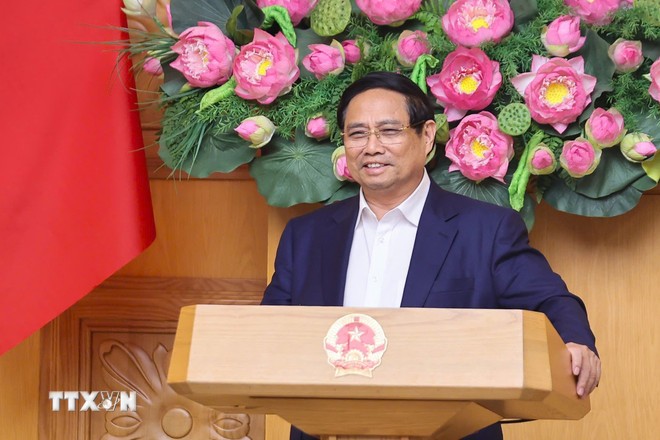 Thủ tướng Phạm Minh Chính làm việc với Hội đồng Tư vấn chính sách. (Ảnh: Dương Giang/TTXVN)