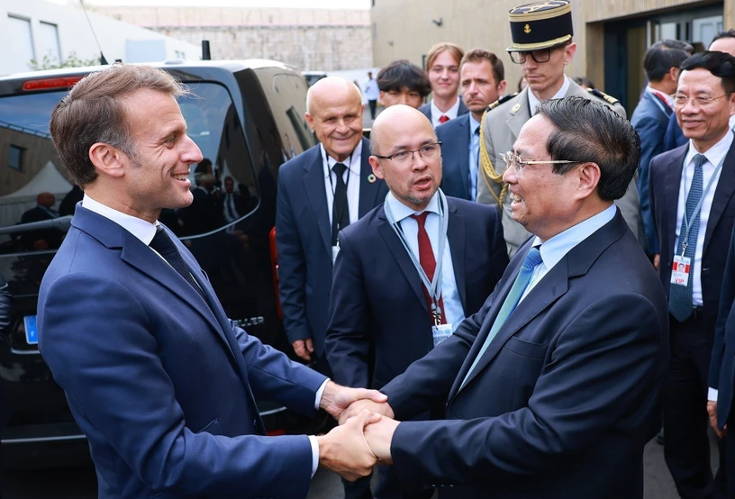 Thủ tướng Phạm Minh Chính hội kiến Tổng thống Pháp Emmanuel Macron. (Ảnh: Dương Giang/TTXVN)