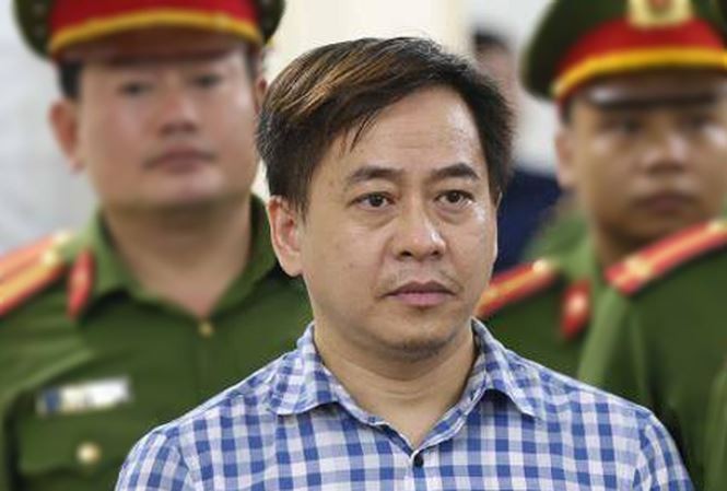 Phan Văn Anh Vũ tại TAND Hà Nội hồi tháng 7. Ảnh: TTXVN.