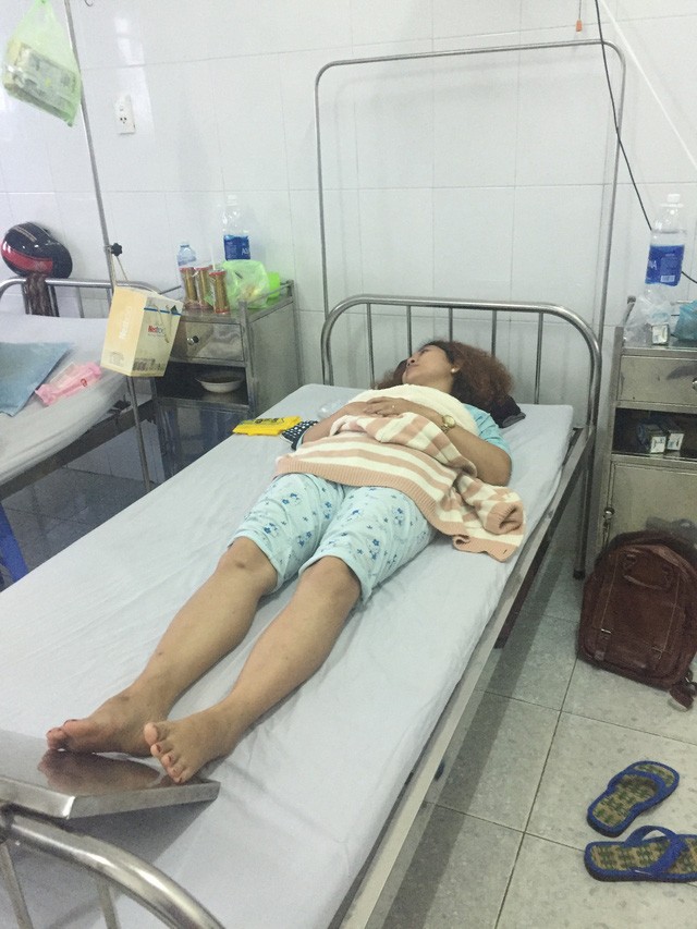 Chị H. vọ của ông Trung. Ảnh: Dân trí