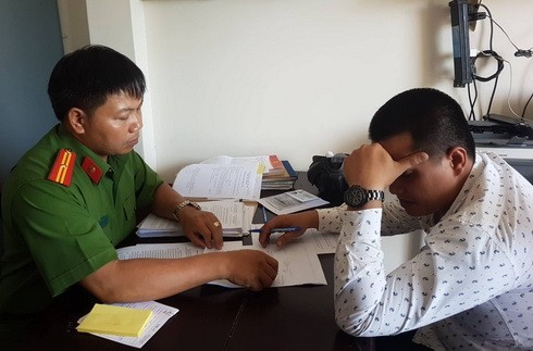 Đối tượng Trực tại cơ quan Công an. Ảnh: Báo Khánh Hòa