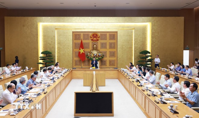 Thủ tướng Phạm Minh Chính chủ trì cuộc họp với Hội đồng Tư vấn chính sách về phát triển kinh tế tư nhân. Ảnh: Dương Giang/TTXVN.