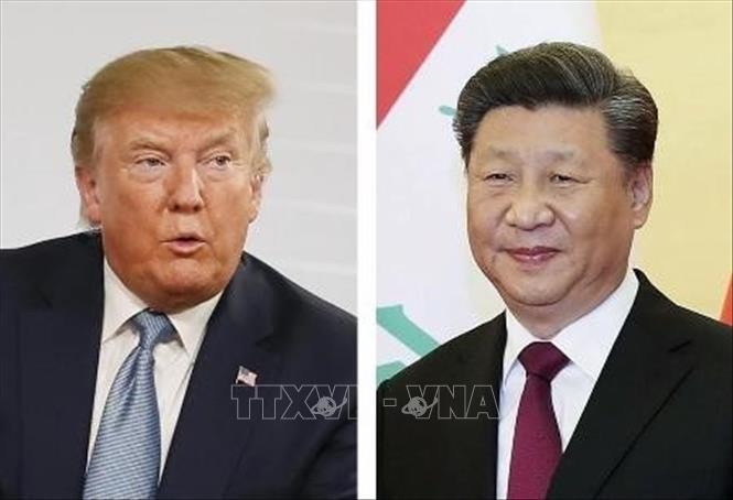Tổng thống Mỹ Donald Trump (trái) và Chủ tịch Trung Quốc Tập Cận Bình. Ảnh: Kyodo/TTXVN