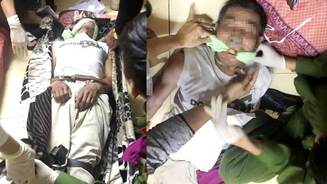 Sau khi đòi treo cổ, đối tượng tiếp tục đòi cắn lưỡi tự tử nên lực lượng chức năng đã khống chế đưa vào nhà sơ cứu. - Ảnh: Tiền Phong