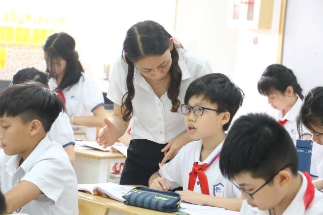 Học sinh trở lại trường học sau dịch COVID-19 - Ảnh: VTC News