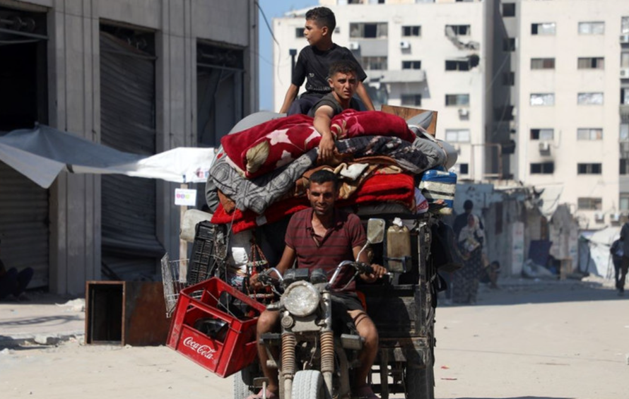 Người dân Palestine sơ tán tránh xung đột tại Gaza.