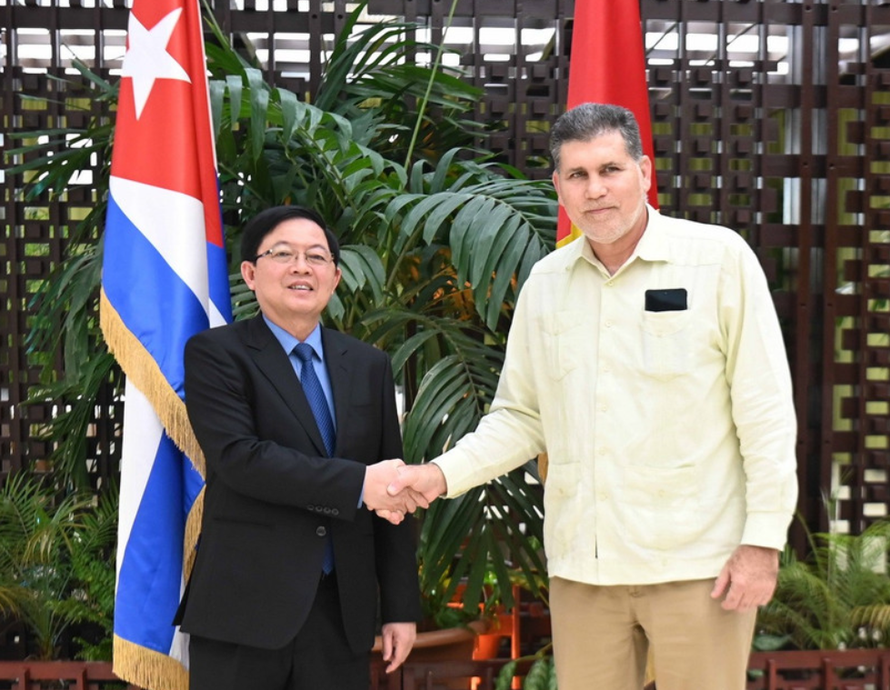 Phó Thủ tướng Hồ Quốc Dũng và Phó Thủ tướng Cuba Óscar Pérez-Oliva Fraga