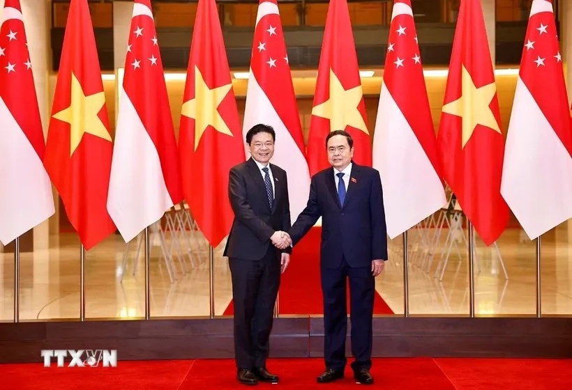 Chủ tịch Quốc hội Trần Thanh Mẫn hội kiến Thủ tướng Singapore Lawrence Wong. Ảnh: Doãn Tấn/TTXVN