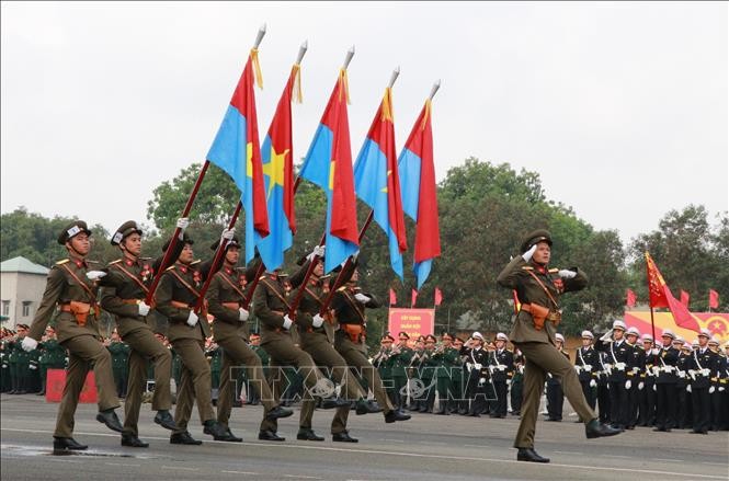 Khối lực lượng vũ trang hợp luyện diễu binh qua lễ đài. Ảnh: Sỹ Tuyên/TTXVN.