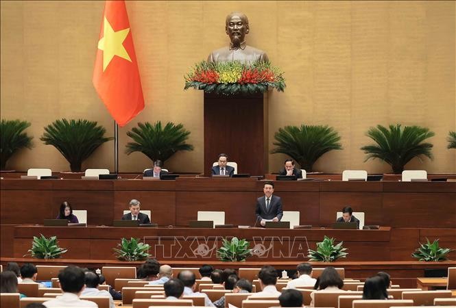 Bộ trưởng Bộ Khoa học và Công nghệ Nguyễn Mạnh Hùng giải trình, làm rõ một số vấn đề đại biểu Quốc hội nêu trong phiên thảo luận ngày 13/5/2025. Ảnh: An Đăng